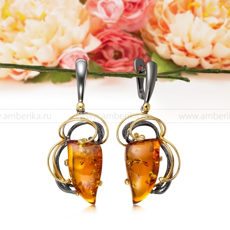 Серьги из серебра, украшенные коньячным балтийским янтарем