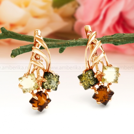 Серьги из серебра, украшенные природным янтарем 