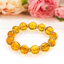 Браслет классический из золотистого балтийского янтаря со стразами 