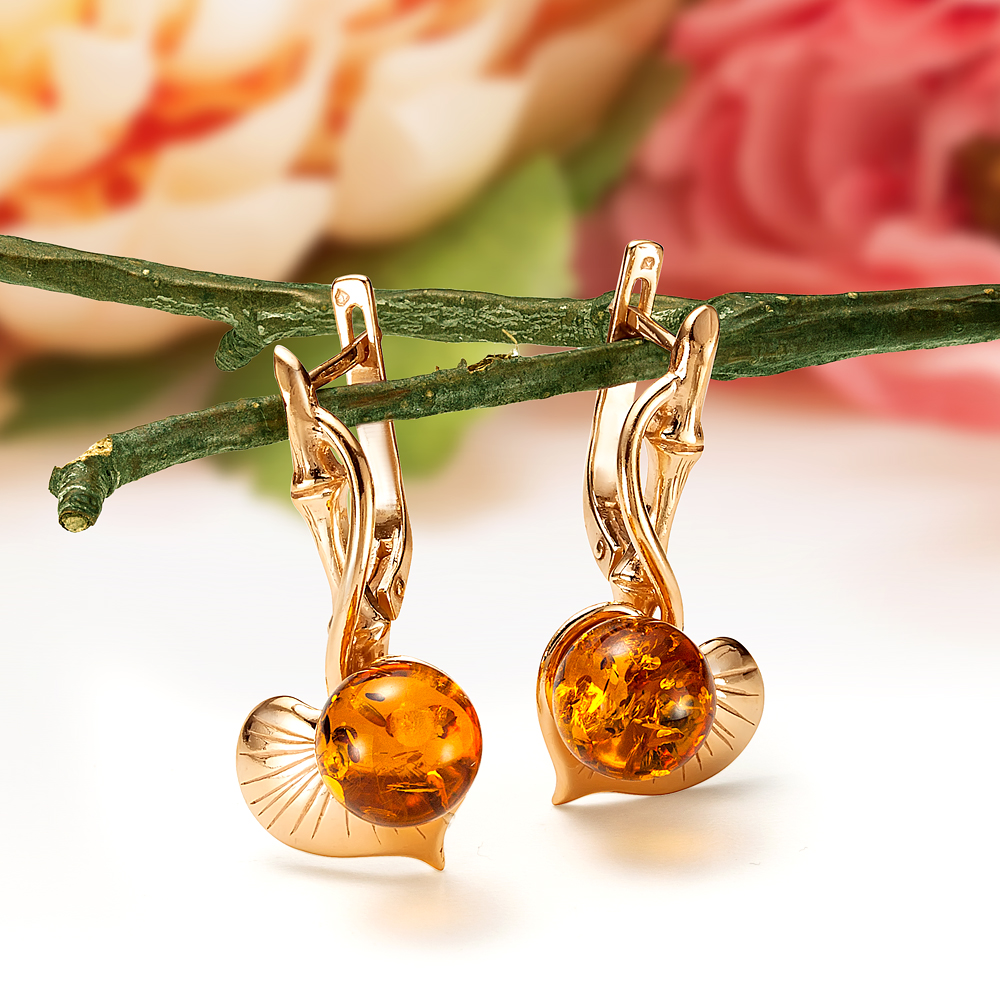 Серьги из серебра 925 пробы, украшенные коньячным природным янтарем, артикул 11640