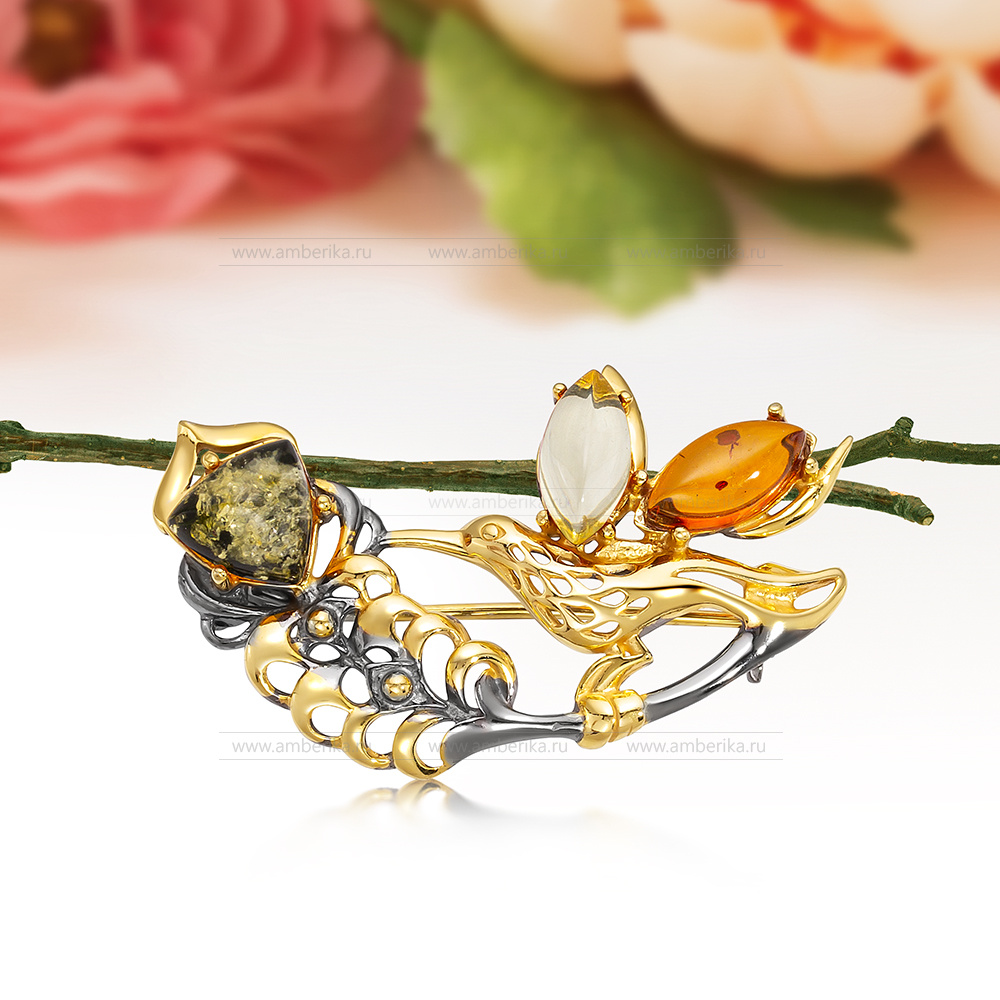 Брошь "Птица" из серебра 925 пробы с натуральным балтийским янтарем "микс", артикул 11965