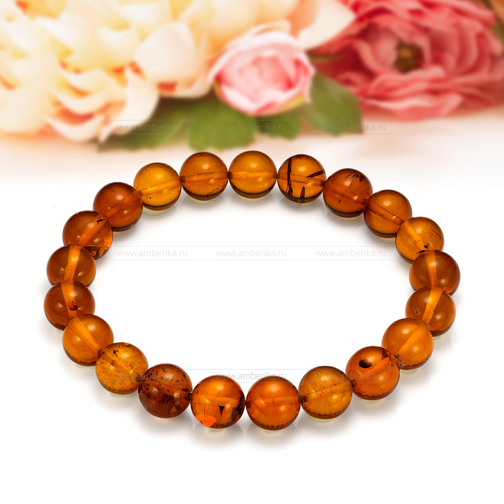 Браслет классический из коньячного балтийского янтаря в форме "шар", артикул 12388