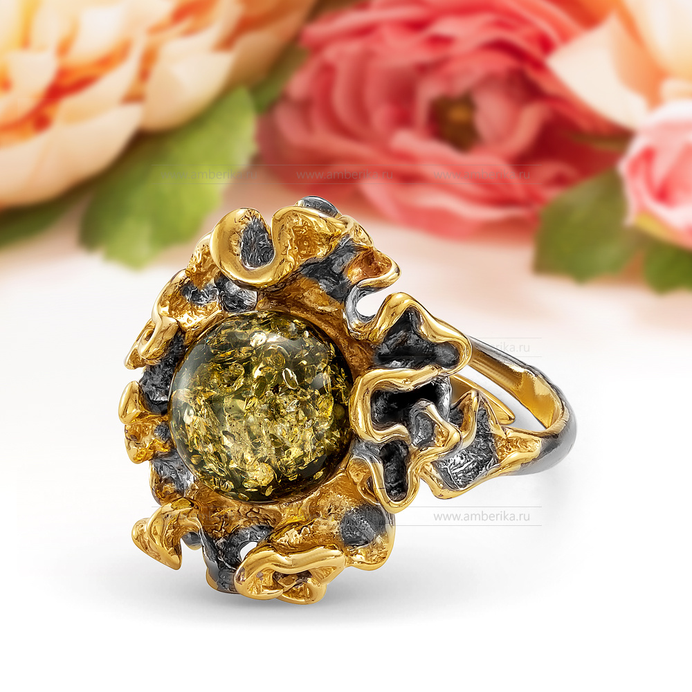 Кольцо "Хризантема" из серебра 925 пробы с зеленым природным янтарем, артикул 11568
