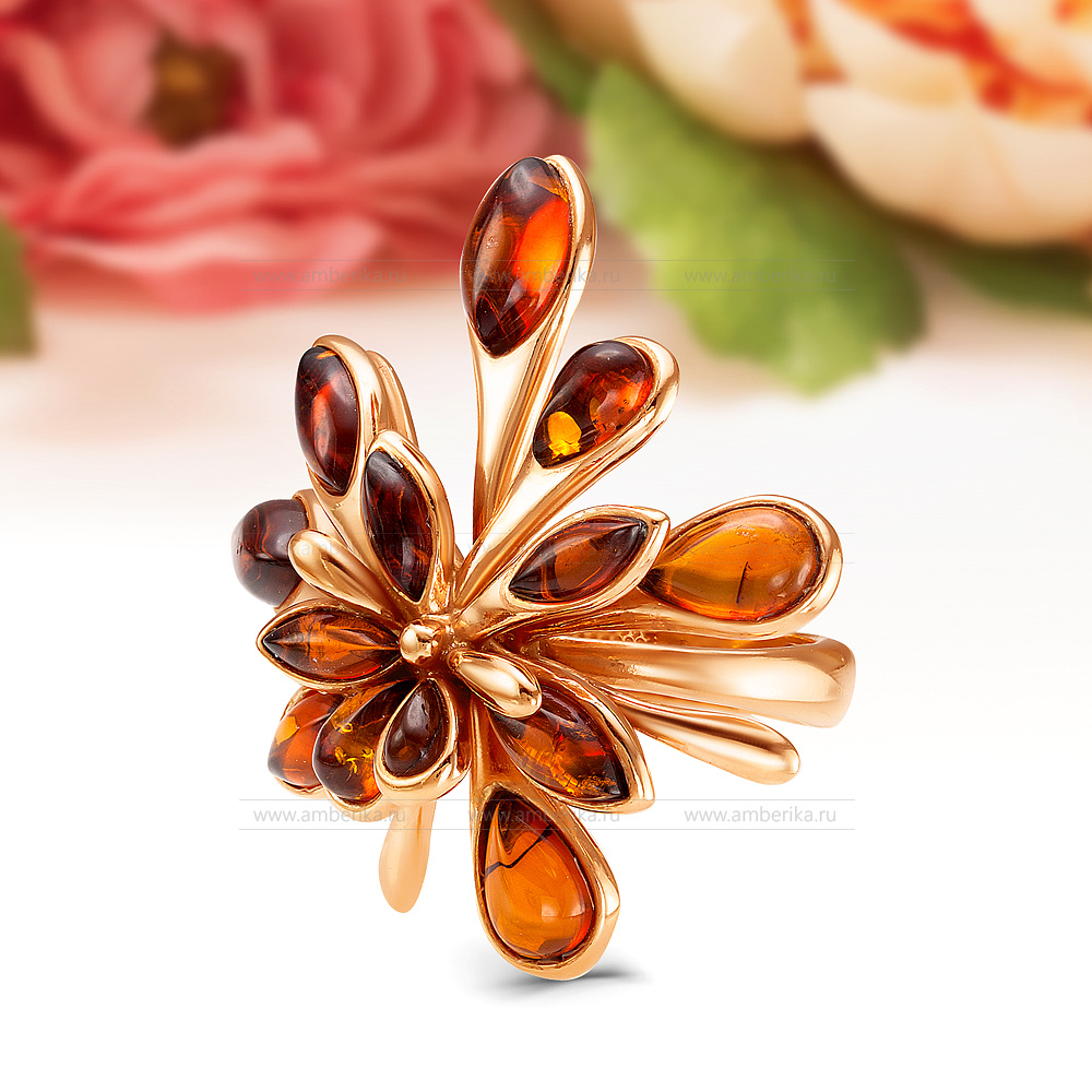 Кольцо "Брызги шампанского" из серебра 925 пробы с коньячным янтарем, артикул 12459