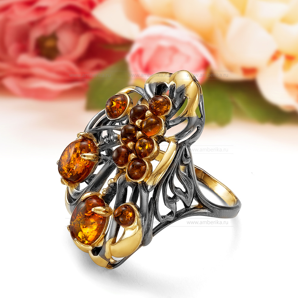 Кольцо "Жар-Птица" из серебра 925 пробы с коньячным балтийским янтарем, артикул 11071